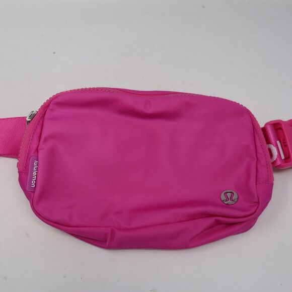 Lululemon Handbags - lululemon Everywhere Belt Bag - Sonic pink/White Word Mark